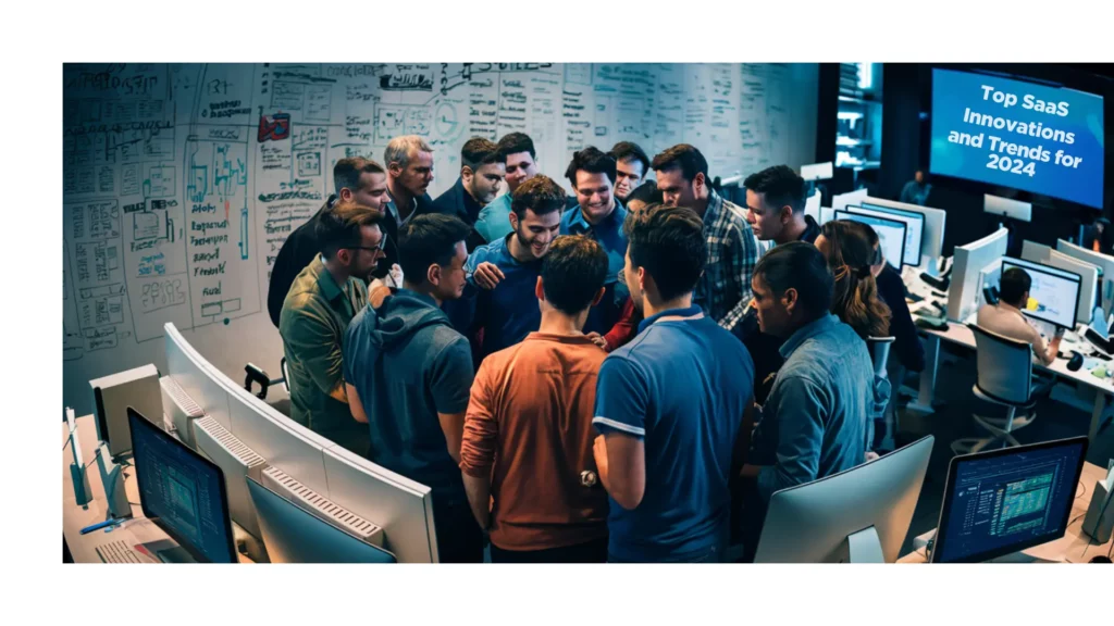 A group of people gather around a central figure in an office space, looking at something of interest. The room has whiteboards filled with notes and diagrams, and a screen displays "Top SaaS Innovations and Trends for 2024." Computers line the perimeter.